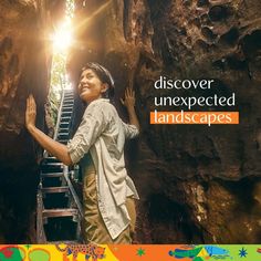 a woman standing in the middle of a cave with stairs leading up to her head