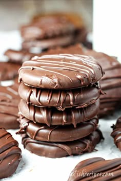 chocolate covered cookies stacked on top of each other