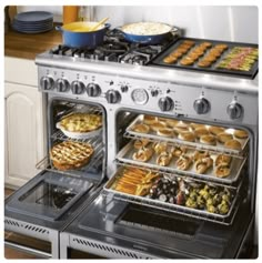 two ovens with food cooking inside of them in a kitchen next to a counter