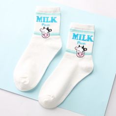 🍼 MILK SERIES ANKLE SOCKS 🍼 90% OF PEOPLE BOUGHT 2 COLORS! Ankle socks are the perfect Harajuku and kawaii fashion accessory. Wear them with anything from sneakers to sandals (yes, socks and sandals are a thing now) and add an extra pop of color to any outfit. 🍓 Fits EU Sizes 35-43, US Sizes 5-8.5 🍌 Stretchy Polyester/Cotton/Spandex Blend 🍼 0 Calories, No Sugar Added! NOTE: DUE TO VERY HIGH DEMAND, PLEASE ALLOW 12-20 DAYS FOR DELIVERY TO THE US, AND 20-45 DAYS TO THE REST OF THE WORLD. Casual Blue Socks With Letter Print, Cute White Socks With Letter Print, Fun White Summer Socks, Fun White Socks For Summer, Playful White Socks For Spring, Comfortable White Socks With Letter Print, Trendy White Summer Socks, Playful White Cotton Socks, White Casual Socks For Spring