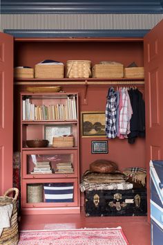 the closet is filled with clothes, books and other things to put on it's shelves