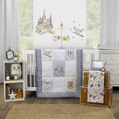 a baby crib bedding set with an image of a castle on the wall