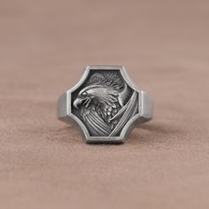 Winged Eagle Oxidized Ring, 925K Sterling Silver Eagle Head Ring, Stylish Eagle Statement Ring, Engraved Birds Ring, Promise Ring for him This Oxidized Eagle Head Wings Ring is a unique and nature-inspired piece of jewelry, perfect for those who appreciate the beauty of the eagle and the power of the bird of prey. The ring features an oxidized eagle with wings, symbolizing freedom, power and strength. It is made of high-quality sterling silver and is handcrafted with precision and care. At Savis Head Wings, Promise Ring For Him, Promise Rings For Him, Oxidized Ring, Bird Rings, Silver Eagle, Head Ring, Silver Eagles, Eagle Head