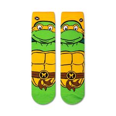 Cowabunga! Show your love for the Teenage Mutant Ninja Turtles with these radical Michelangelo socks. Featuring Mikey in his signature orange mask and a big smile, these socks will make you feel like you're ready to take on the world. Wear them with pride and channel your inner turtle power. Michelangelo Socks, Donatello Ninja Turtle, Raphael Ninja Turtle, Leonardo Ninja Turtle, Mens Socks Fashion, Sock Lovers, Mens Crew Socks, 90s Cartoon, Crazy Socks