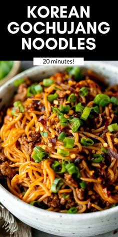 korean gochuang noodles in a white bowl with green onions on top and text overlay