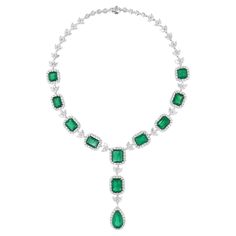 Indulge in the captivating allure of this exquisite Natural Zambian Emerald Gemstone Necklace, a true masterpiece of elegance and sophistication. Crafted with precision and passion, this necklace showcases the mesmerizing beauty of Zambian emeralds set in lustrous 18 karat white gold, adorned with dazzling diamonds. Item Code :- SEN-51194 Gross Wt. :- 62.89 gm 18k Solid White Gold Wt. :- 45.93 gm Natural Diamond Wt. :- 23.73 Ct. ( AVERAGE DIAMOND CLARITY SI1-SI2 & COLOR H-I ) Zambian Emerald Wt. 1stdibs Jewelry, Mesmerizing Beauty, Necklace Diamond, Zambian Emerald, Antique Necklace, White Gold Jewelry, Emerald Gemstone, Zambia, High Jewelry