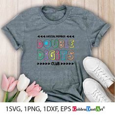 a t - shirt with the words double digits club on it next to some flowers