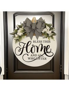 a door with a sign that says, please this home and ame who enter