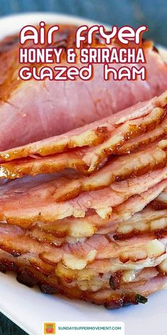 there is a white plate with ham on it and the words air fryer honey & sriraca glazed ham