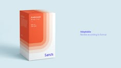 an orange and white carton for sanus against a blue background