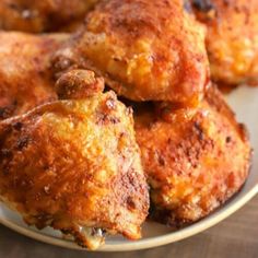 some fried chicken on a white plate