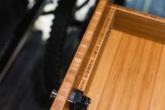 an open wooden box sitting on top of a table