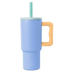 a blue and yellow cup with a straw in the middle is on a white background