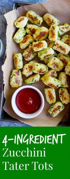 an image of some food that is on a tray with ketchup and sauce