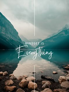 the words mindset is everything on top of a lake with rocks and mountains in the background