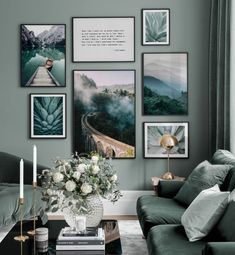 a living room with green walls and pictures on the wall above the couch, along with a coffee table