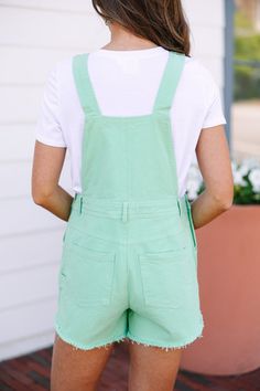 Who doesn't love a pair of cute overall for the summer! These in particular are truly adorable! We love their coloring and those causal raw hems. These overalls features pockets, raw hems, and a classic fit.
Material has a fair amount of stretch.Sydney is wearing the small. Green Dungarees Outfit, Green Dungarees, Dungarees Outfit, Dungaree Outfit, Mint Julep Boutique, Mint Julep, Denim Overalls, Personal Marketing, Dungarees