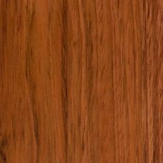 a close up view of a wooden surface with some grainy woodgrains on it