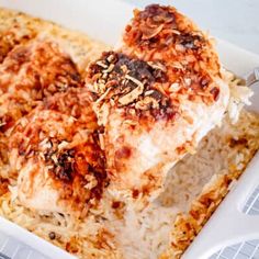 a casserole dish with rice and meat in it on a cooling rack, ready to be eaten