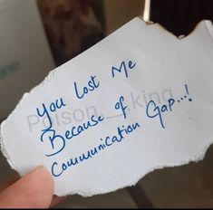 someone holding up a piece of paper that says, you lost me because of communication gap