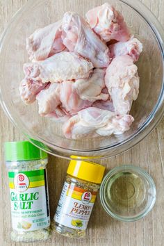 ingredients to make chicken wings in a glass bowl