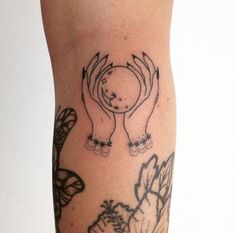 a tattoo on the leg of a person