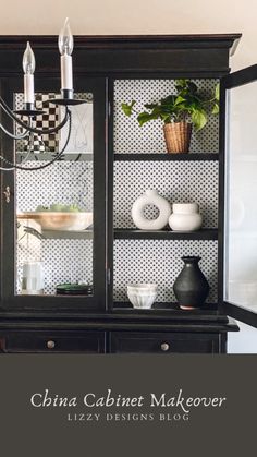 a black china cabinet with glass doors and plants on top, next to a potted plant