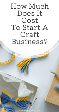 the words how much does it cost to start a craft business? surrounded by yarn and scissors