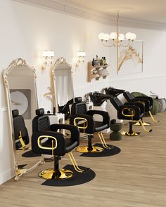 a row of black and gold chairs sitting in front of a mirror on top of a hard wood floor