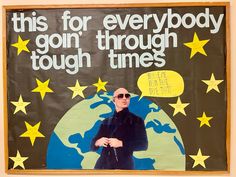 a poster with a man wearing sunglasses in front of the earth and stars on it