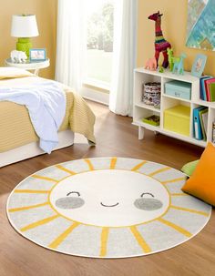 a child's bedroom with yellow walls and white bedding, rugs on the floor