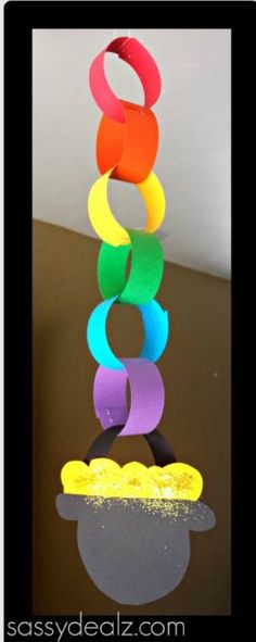 this is an image of a paper sculpture made out of construction material and colored paper