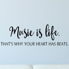 a wall decal with the words music is life that's why your heart has beats