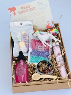 a box filled with lots of different types of confection and bath products on top of a table