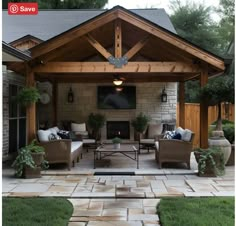 an outdoor living area with seating and fireplace