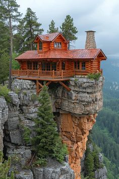 a wooden cabin sitting on top of a cliff