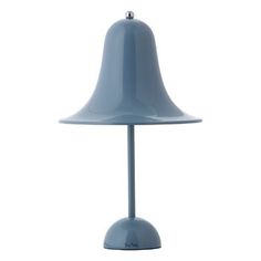 a blue table lamp on a white background