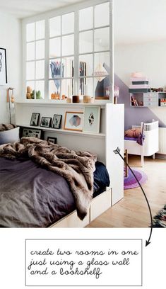 a bed room with a neatly made bed and pictures on the wall