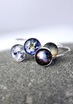 "A sterling silver galaxy ring made with the celestial image of your choosing from available options. This is a simple and clean 100% sterling silver celestial stacking ring custom made in your size with an image from our Universe under glass. Please see our image selections to see what bit of the cosmos your ring can feature! Makes a wonderful gift for any science fashionista or lover of outer space. Ring size: Made to order in your size - please select Image size: 3/8\" (8mm) Materials: Sterli Space Ring, Space Rings, Photo Ring, Galaxy Ring, Space Jewelry, Celestial Jewelry, Ring Sterling Silver, Stackable Rings, Stacking Rings