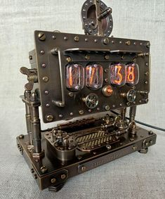 an old fashioned clock made out of metal