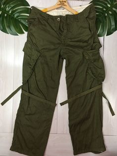 THANK VERY MUCH FOR VISIT OUR PAGE.PLEASE READ CAREFULLY OUR DESCRIPTION AND SATISFIED FIRST Japanese Multipocket Green Army Pants Size : Medium  Condition 9/10  Actual Measurement :  Waist: 34 inches Total Length: 38 Inches Leg size: 9.5 Inches Knee size : 10.5 Inches Inseam: 28 inches Please look detail at the photo for confirmation. If any question please ask to me. **Please dont expect the pieces in mint condition unless state.Its because vintage or used item may have sign of wear.T Importan Utility Olive Parachute Pants With Pockets, Military Olive Cargo Pants With Side Pockets, Olive Military Cargo Pants With Side Pockets, Olive Military Cargo Pants With Multiple Pockets, Utility Olive Cargo Pants With Side Pockets, Olive Utility Cargo Pants With Side Pockets, Olive Cargo Trousers With Pockets, Military Style Olive Parachute Pants With Pockets, Olive Military Pants With Cargo Pockets