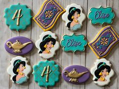 decorated cookies are arranged in the shape of princesses