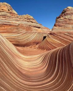 an image of waves in the sand that is very colorful and interesting to look at