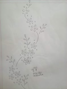 a drawing of some flowers on a white paper