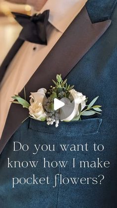 a man wearing a suit and tie with flowers on it's lapel pocket