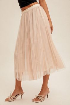 Women's Mesh Pleated Skirt Ballerina Midi Skirt This Ballerina Midi Skirt comes in both white and black, giving you the perfect versatile look. With its multiple layers and lined design, it's perfect for achieving a cute and flowy look. Plus, the elastic band adds a touch of ballerina vibes to this adorable midi skirt. Details Available in sizes: S-L Available in colors: White and Black Layered Lining Mesh Pleated Midi skirt Elastic band Fabric 100% Polyester Sizing Small: 2/4, Medium: 6/8, and Feminine Pleated Tiered Skirt, Feminine Tiered Pleated Lined Skirt, Summer Midi Tulle Skirt, Feminine Relaxed Pleated Skirt For Party, Feminine Tiered Lined Skirt, Elegant Skirt With Elastic Waistband For Spring, Elegant Spring Skirt With Elastic Waistband, Elegant Mini Tulle Skirt, Elegant Pleated Tiered Tulle Skirt