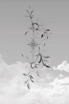 a black and white photo with flowers in the sky