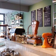 a coffee shop with lots of items on the counter