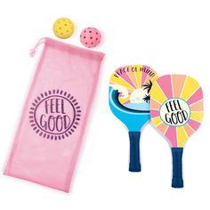 two paddles and a pink bag on a white background with the words feel good