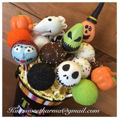 there are many halloween treats in the bucket